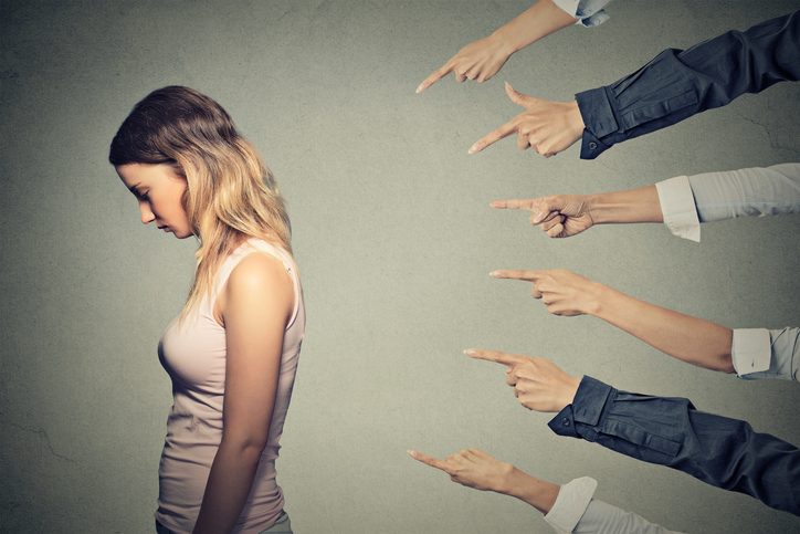 hands pointing fingers at person