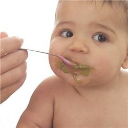 Baby being fed