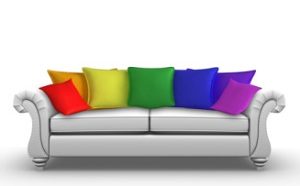 Couch with rainbow pillows