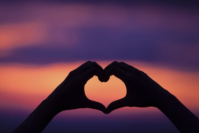 hand heart shape love sunset
