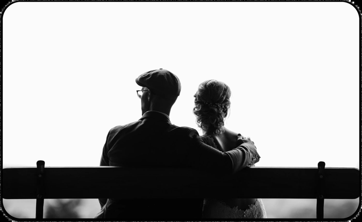 Couple sitting closely on a bench, symbolizing healing and connection in abandonment wounds therapy.