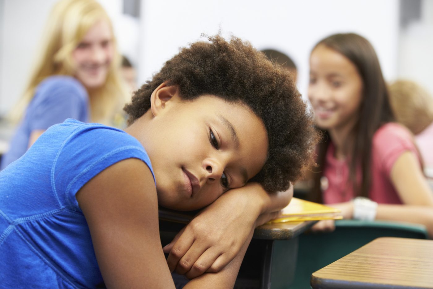 Unhappy Girl Being Bullied In Class