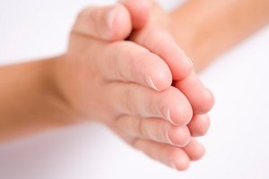 Hands pressed together in prayer