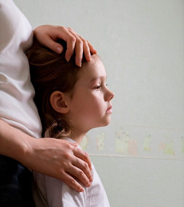 Side view of mother and child